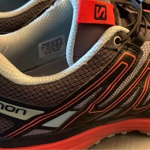 Salomon Running Shoe in Gray with Orange Accents 8.5 used in good condition